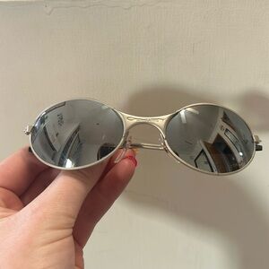 Silver Oakley sunglasses